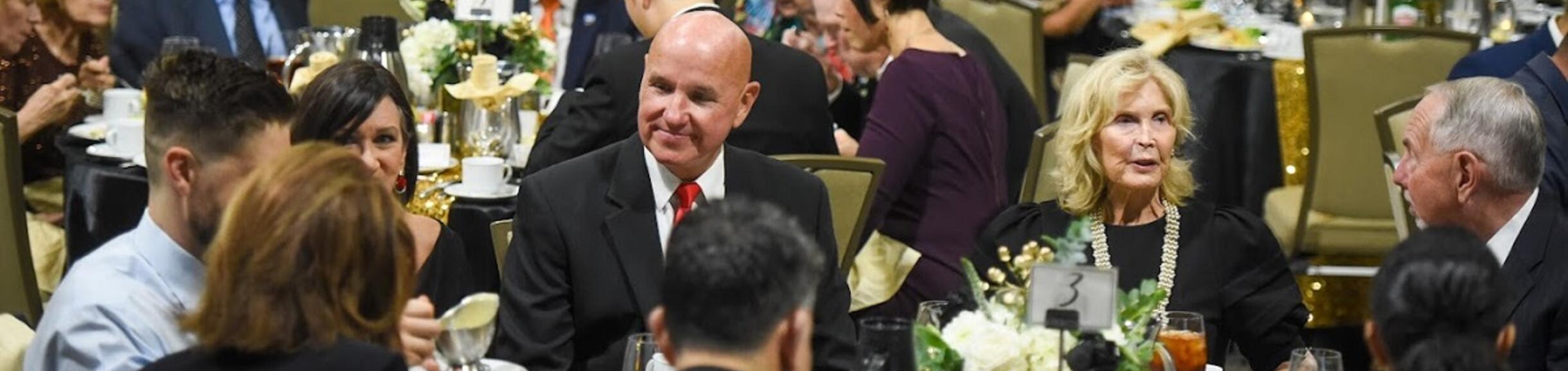 Photo of people sitting in the audience at a recent gala