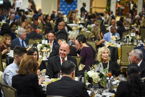 Photo of people sitting in the audience at a recent gala